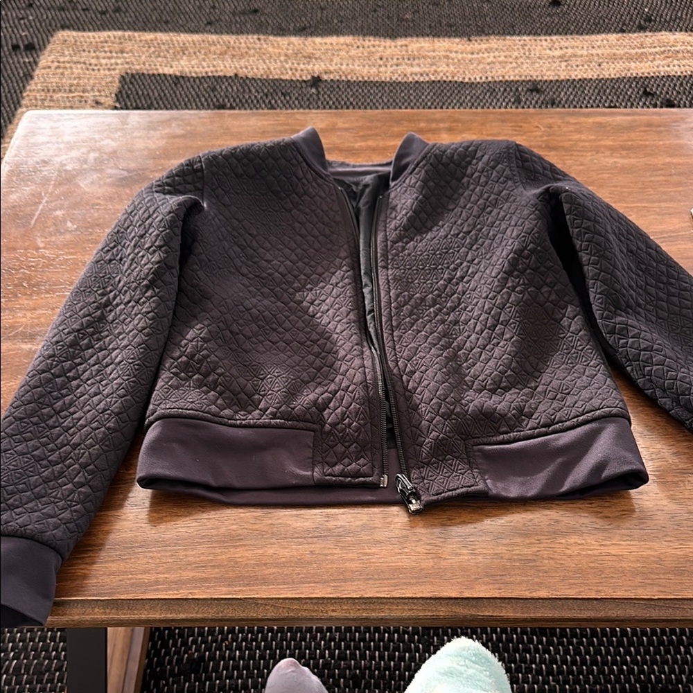 Reversible IVVIVA (kids lululemon) Quilted Black Bomber Jacket, reversible.